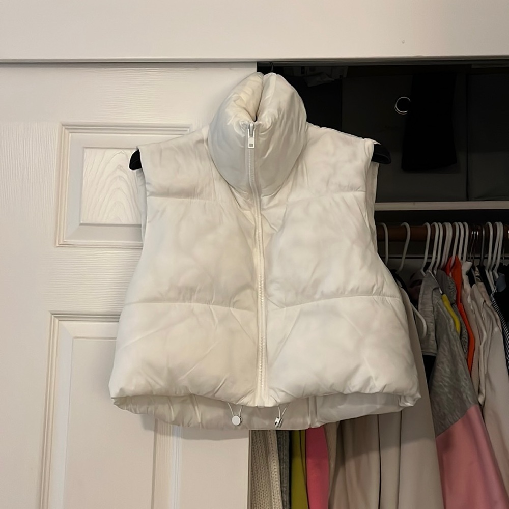 White puffy vest